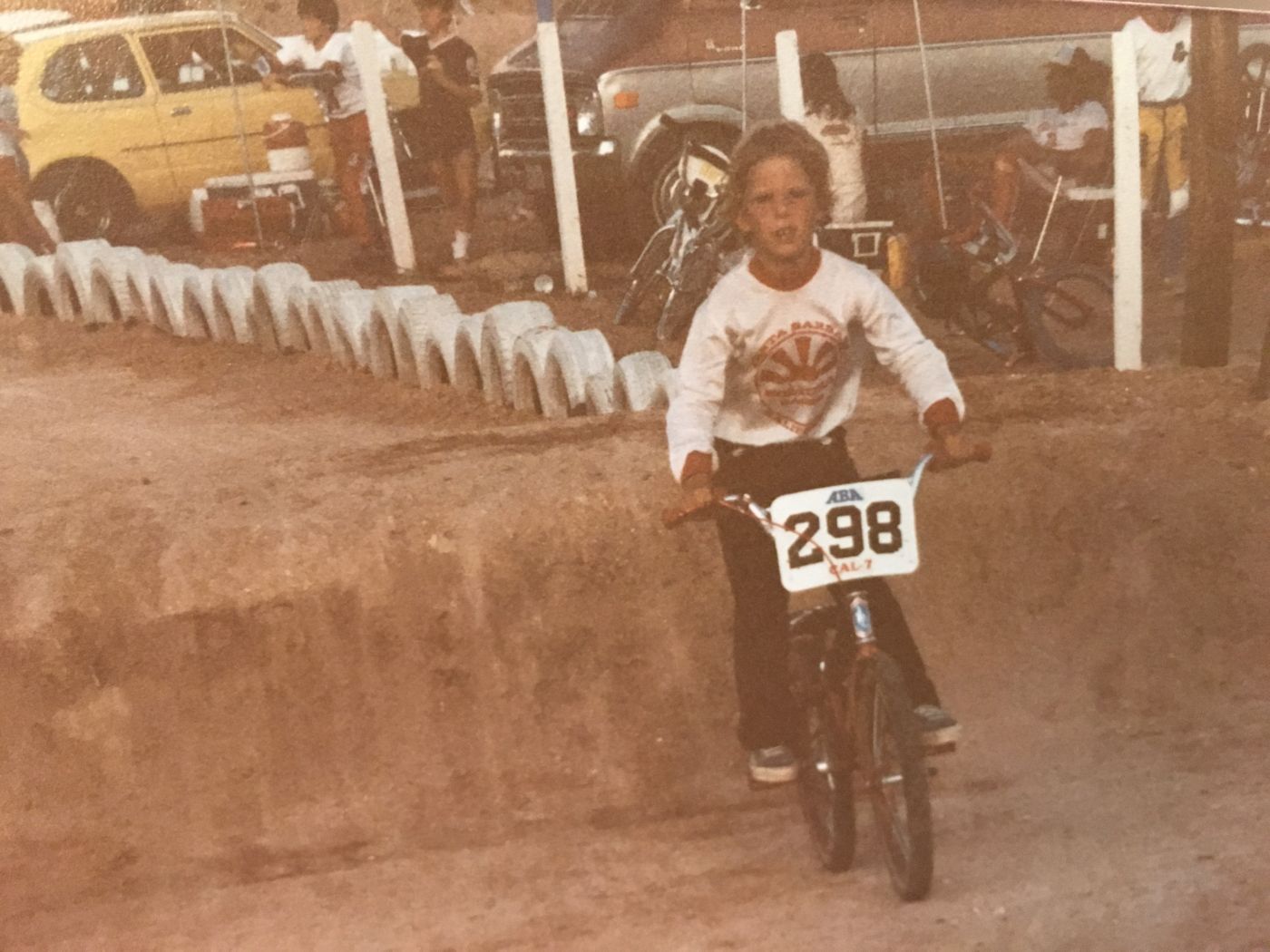 Young Brian racing BMX, number 298