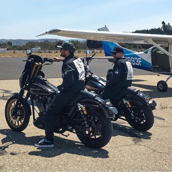 Peter Kim on a motorcycle at Lompoc Airport
