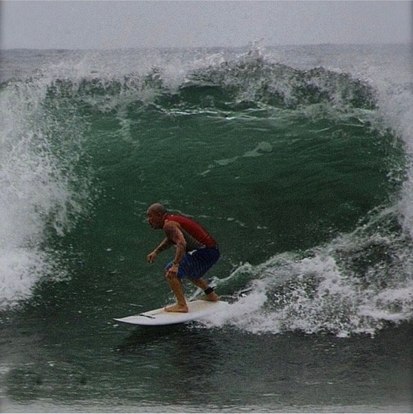 Peter Kim surfing at Malibu