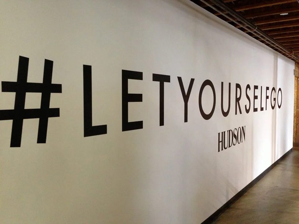Let Yourself Go store wall